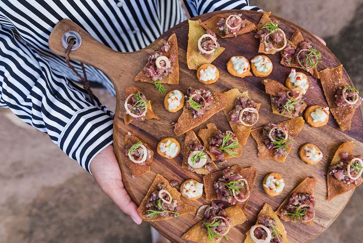 Canapes on a wooden platter